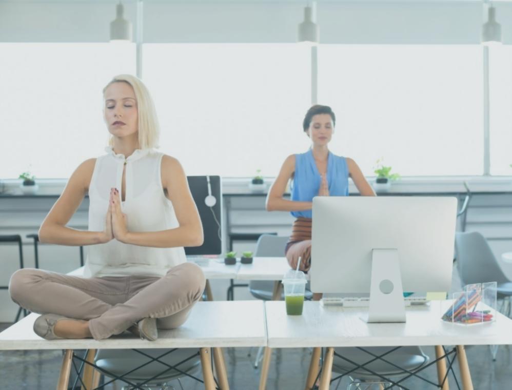 Person practicing lying meditation in serene environment